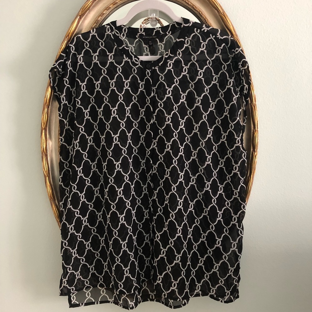 Sheer Banana Republic sleeveless blouse.